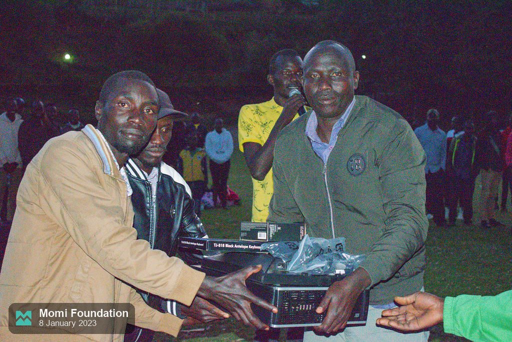 A prize being handed over at the closing ceremony