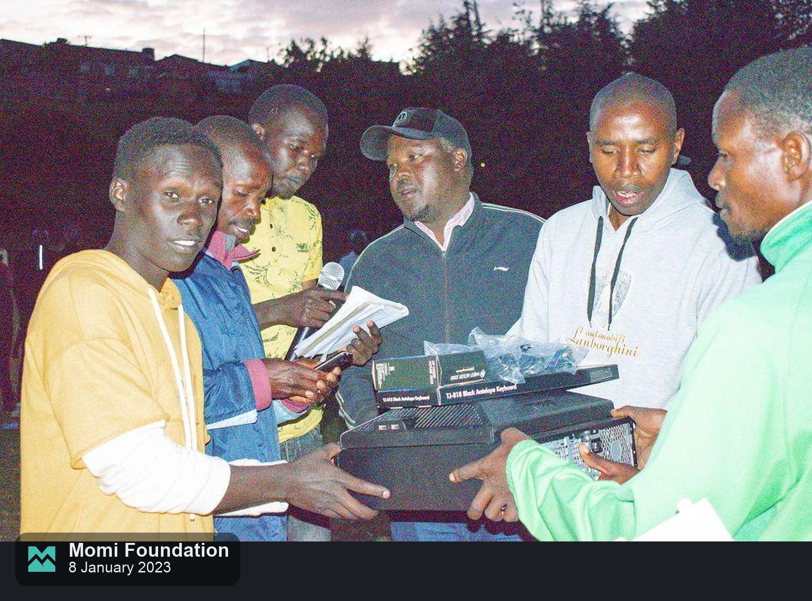 A desktop computer handed over for schools at the first MOMI football tournament final