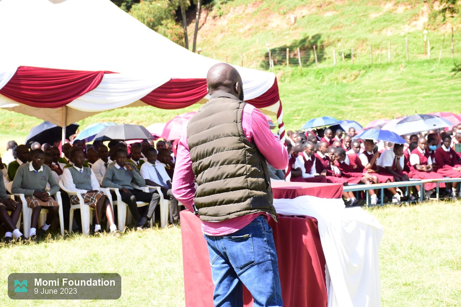 A guest speaks to students at the Moi Girls marathon