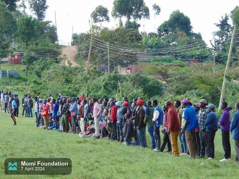 Fans lining the touchline at Kamoi playgrounds for the Sengwer ward final