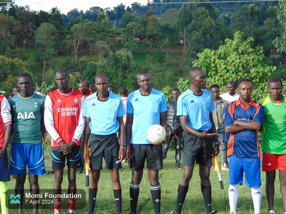Referees and team captains lined up before the Sengwer ward final