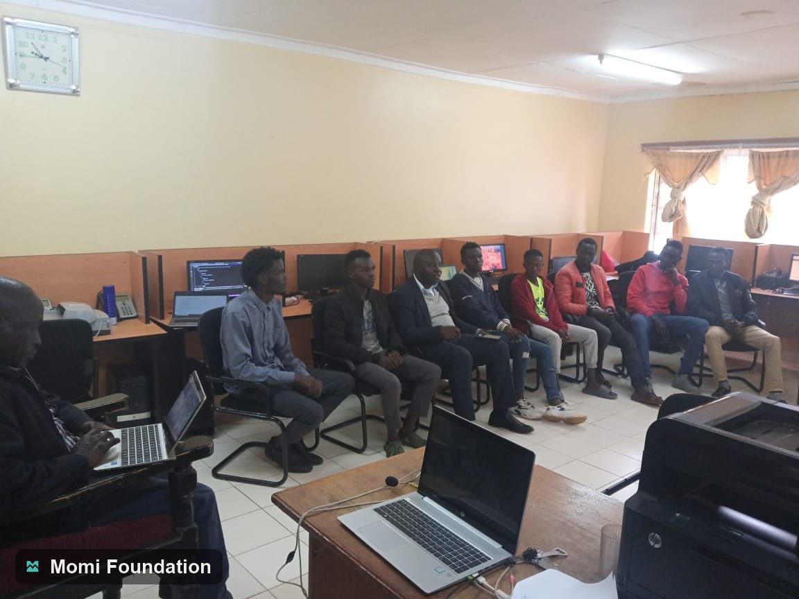A computer skills session in progress